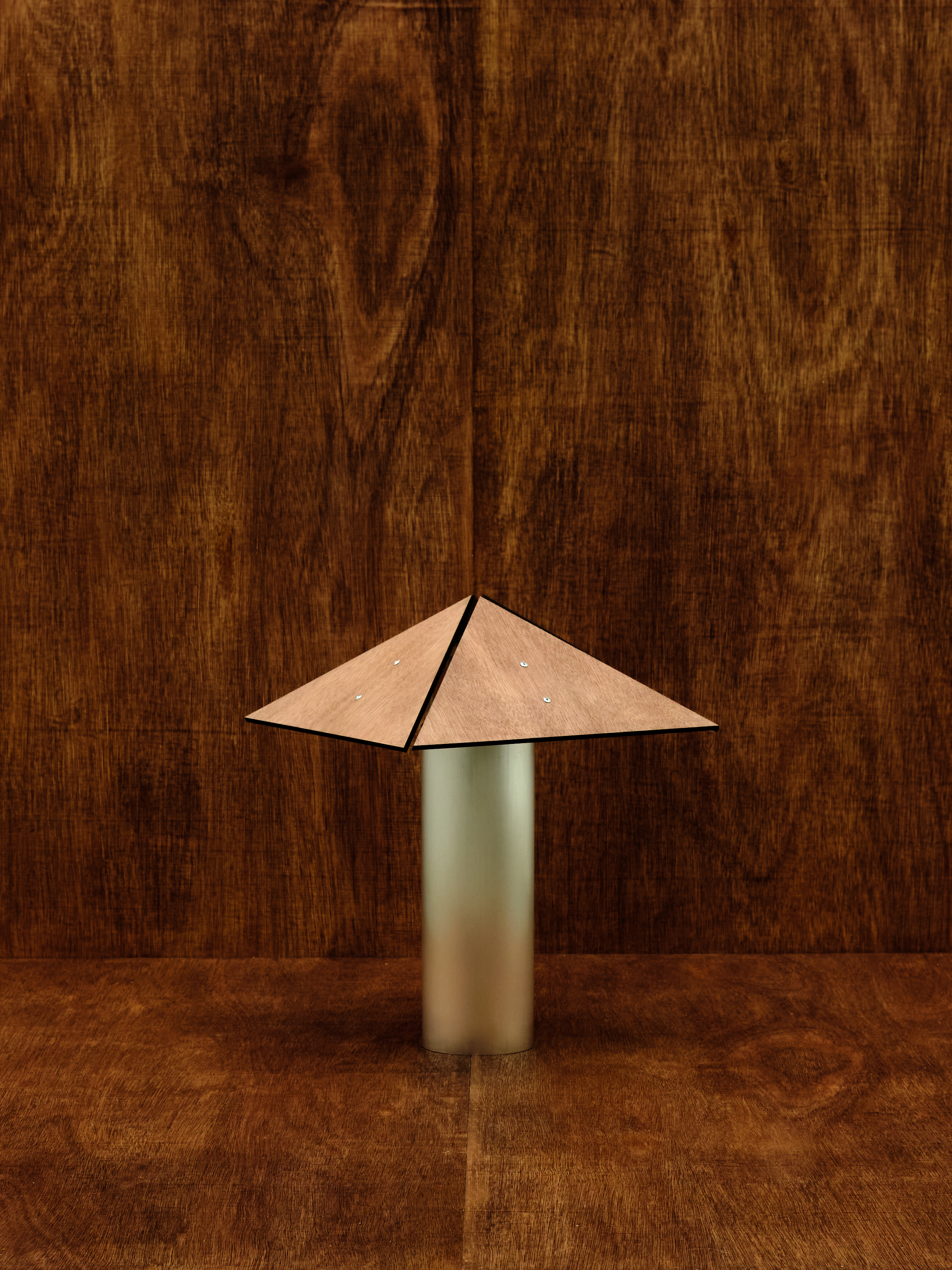 Decorative lamp with a geometric design on a wooden background
